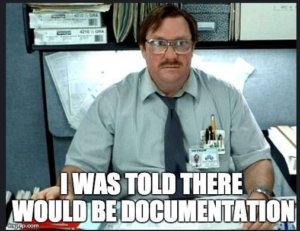 Office worker with cluttered desk and humorous caption